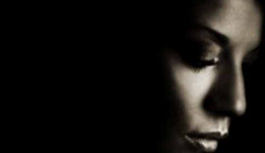 Black and white profile of a woman thinking, used for Brampton Women's Clinic blog content.