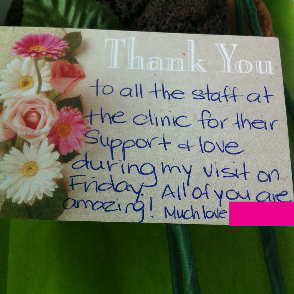 A card with a floral design and a personal message of thanks for Brampton Women's Clinic.