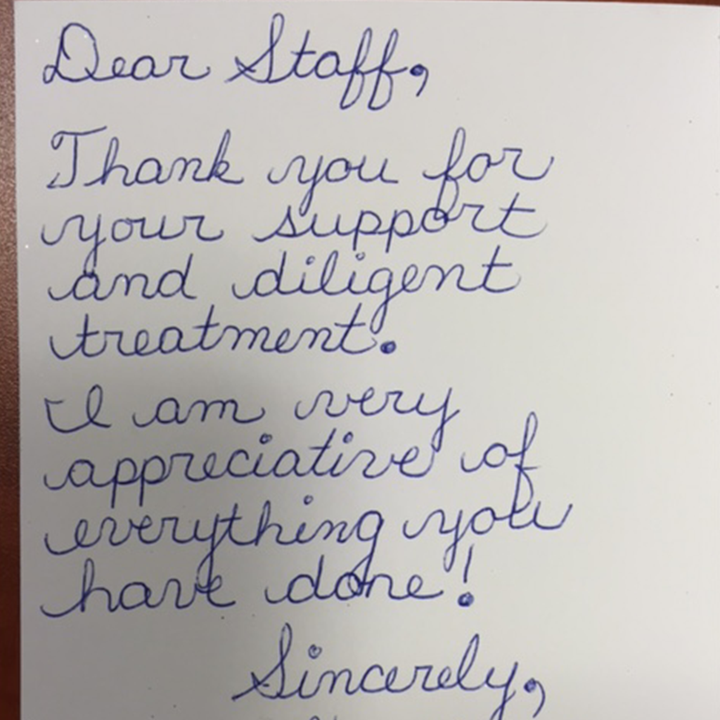 A "Thank You" card with handwritten message for the supportive staff at Brampton Women's Clinic.